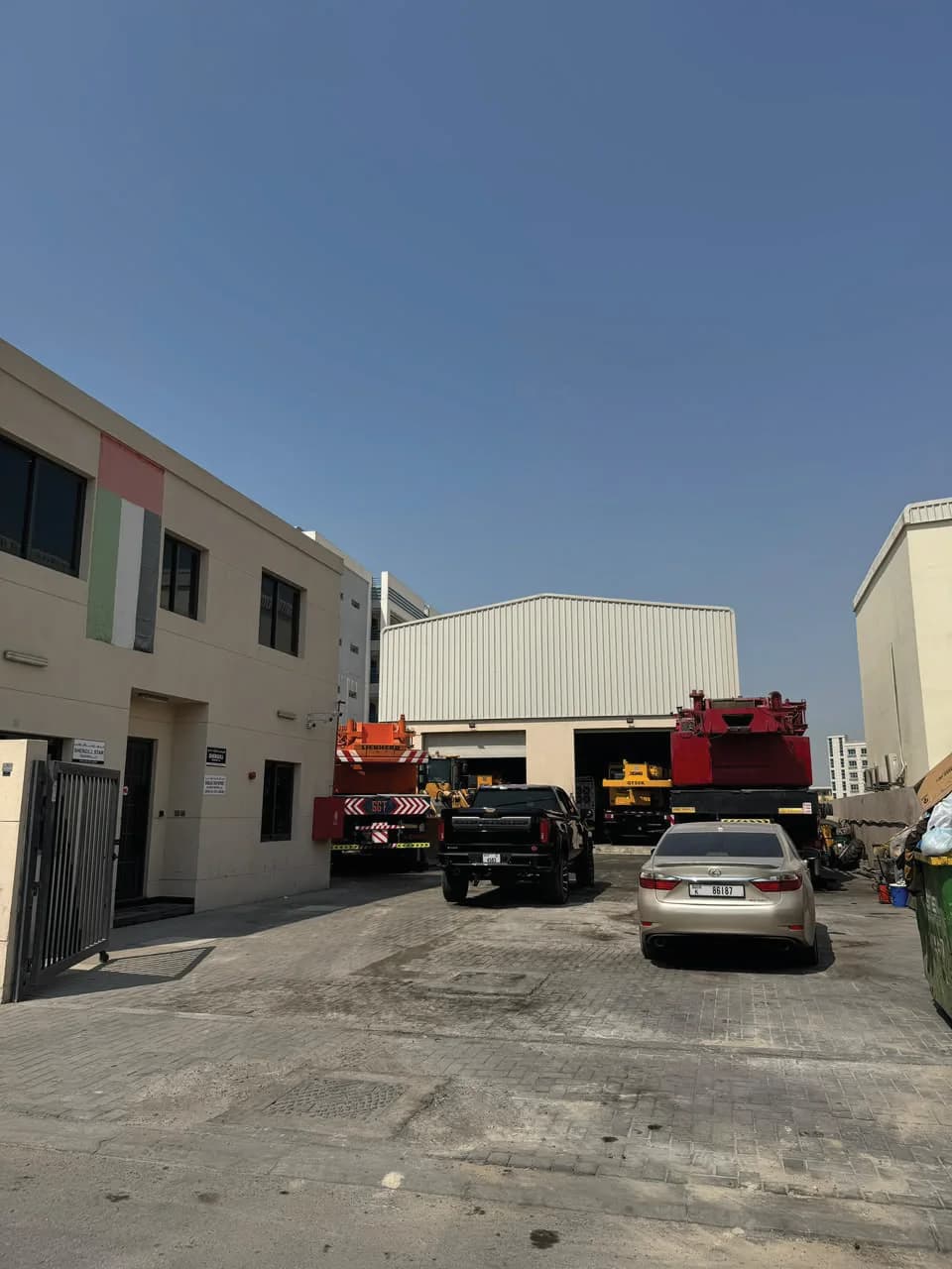 Shergill Transport office and yard with cranes and fleet vehicles