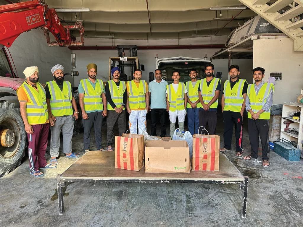 Shergill Transport workshop team in high-visibility vests