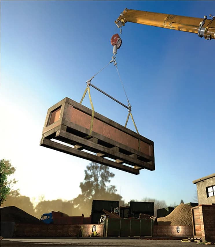Crane lifting a heavy steel load on site