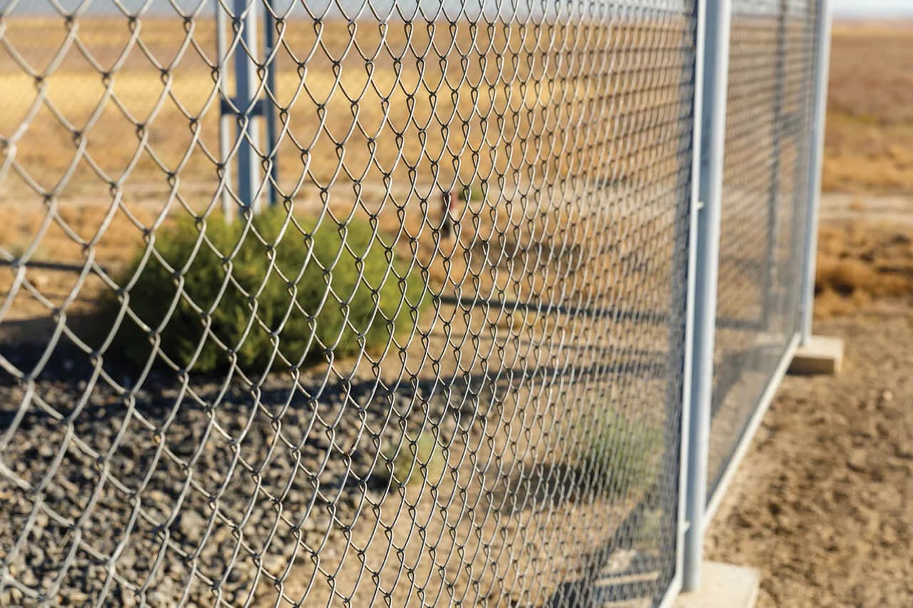 Chain-link fencing around a construction site boundary